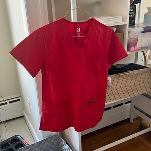Brand new never been worn DAGACCI Scrub top!